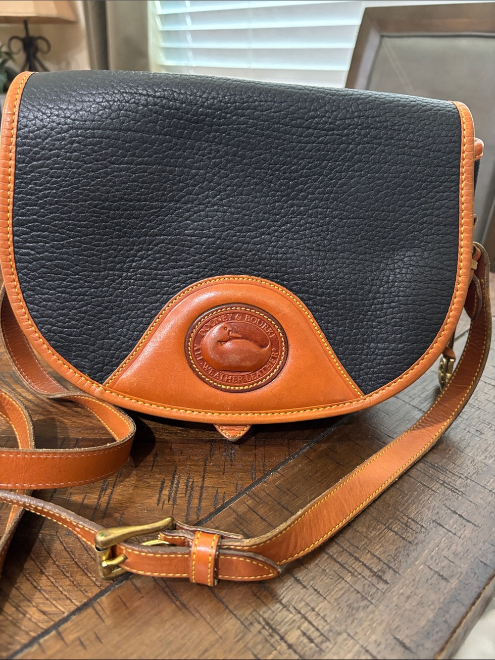 Dooney & Bourke Navy with Brown Trim Pebbled Leather Crossbody